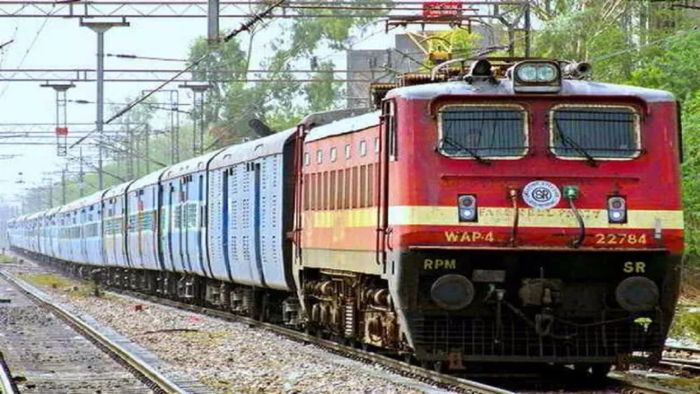 SECR train standing at a station in Chhattisgarh during track maintenance work