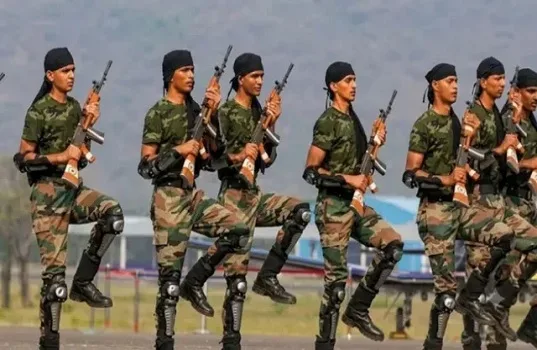Indian CAPF paramilitarists standing in formation during a official event.