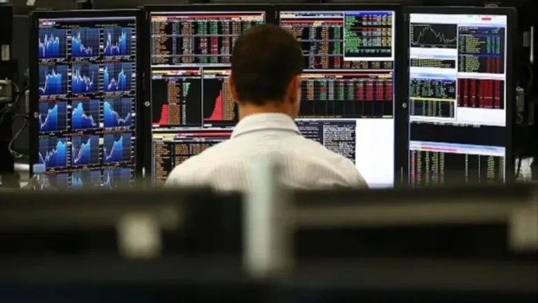 Stock market crash graph on digital screen representing global market decline due to tariff announcements.
