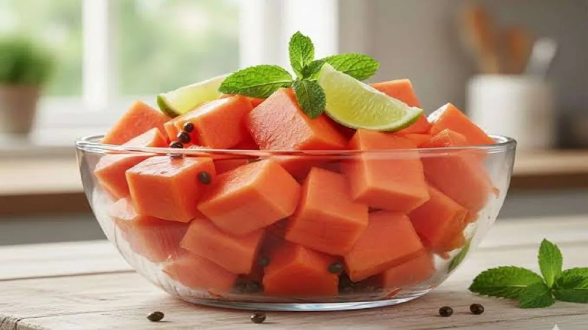 Fresh sliced papaya fruit on a wooden board