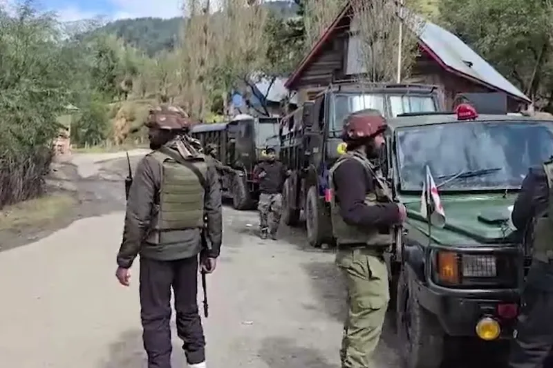 Security forces patrolling a blocked area after a terror attack in Kulgam.