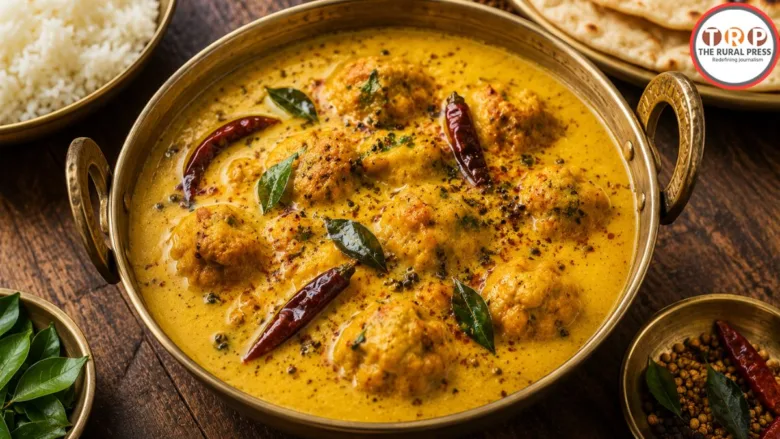 Hot and spicy traditional Marwadi kadhi served in a bowl with spices and ghee tadka