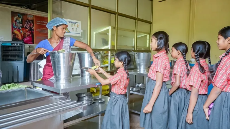 Rural mothers providing fresh vegetables for school meals in Surguja Chhattisgarh
