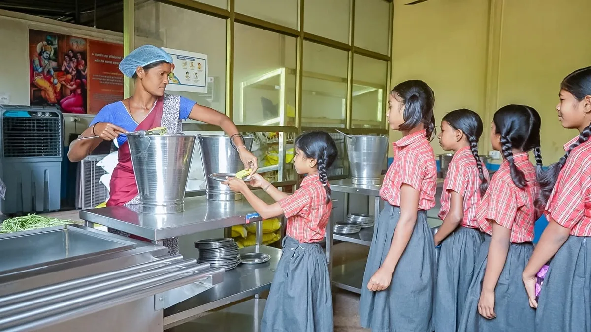 Rural mothers providing fresh vegetables for school meals in Surguja Chhattisgarh