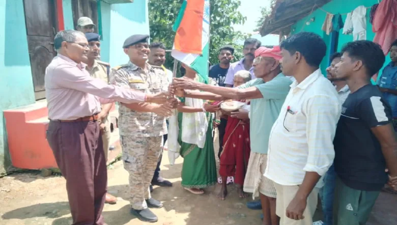 Officials honoring martyr family with national flag during Har Ghar Tiranga campaign in Naxal free Bijapur