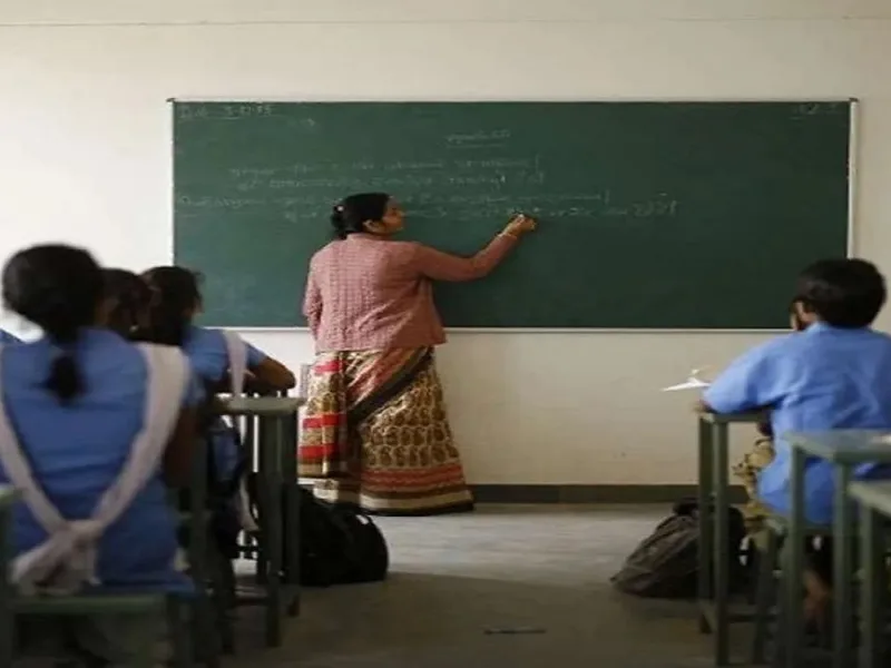 Guest teachers teaching students in a government school in Chhattisgarh