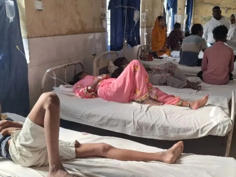 Patients being treated at a hospital after falling ill following a feast in Bihta Patna
