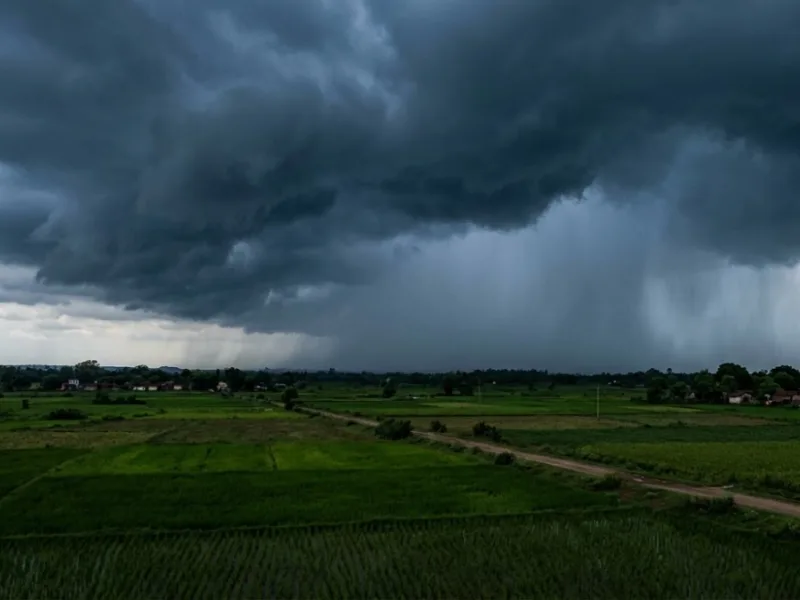 Dark monsoon clouds and heavy rain over Chhattisgarh landscape