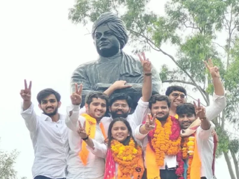 Students celebrating DUSU election victory on the Delhi University campus