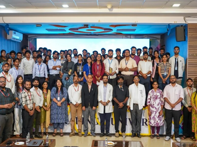 Students and faculty members attending the National Pharmacovigilance Awareness Week seminar and displaying posters at Kalinga University.