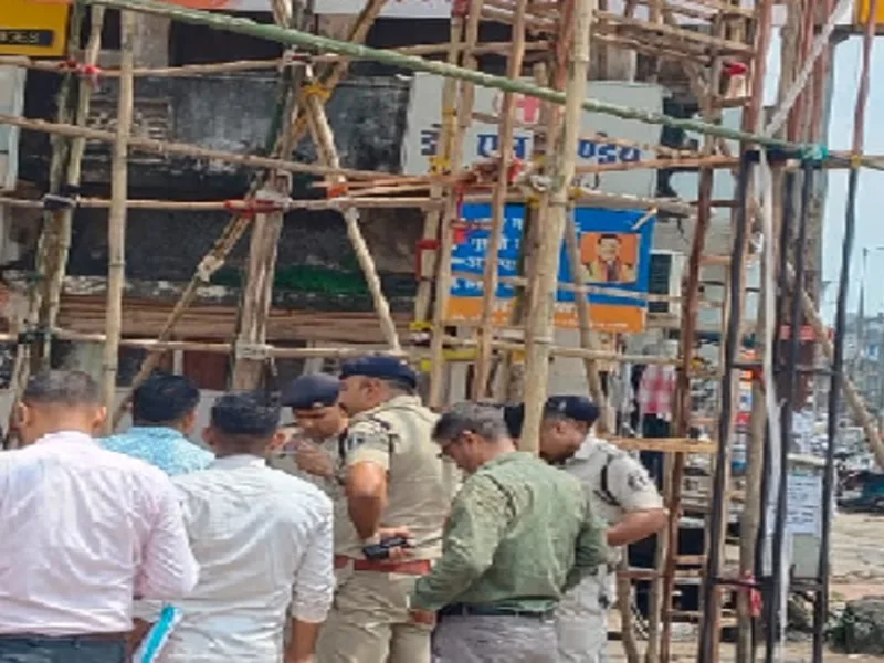 Raipur police and municipal corporation officials inspecting roadside Ganesh pandals