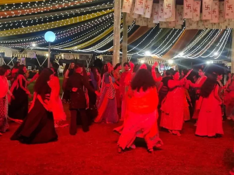 Garba pandal during Navratri with devotees and police investigation related to jewellery allegations
