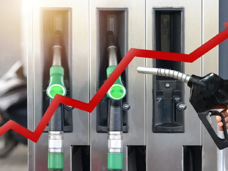 Fuel prices hike concept showing a fuel dispensing machine at a petrol pump in India.
