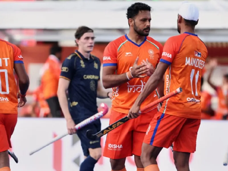 Indian men's hockey team celebrating their gold medal victory