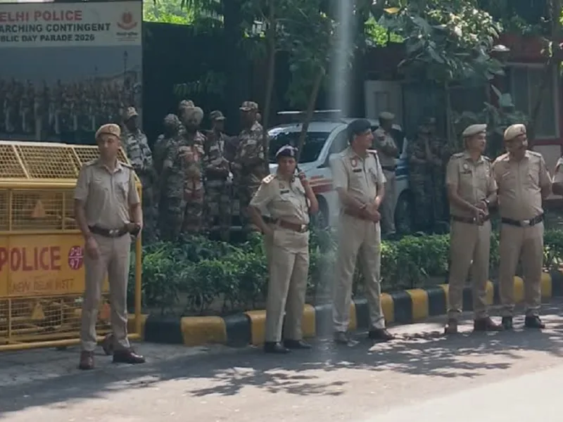 Delhi Police personnel deployed for Dussehra security and traffic management near Ramlila grounds.